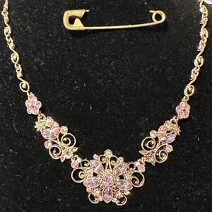 Gold-tone statement necklace with pink rhinestone 15” + 3” ext.